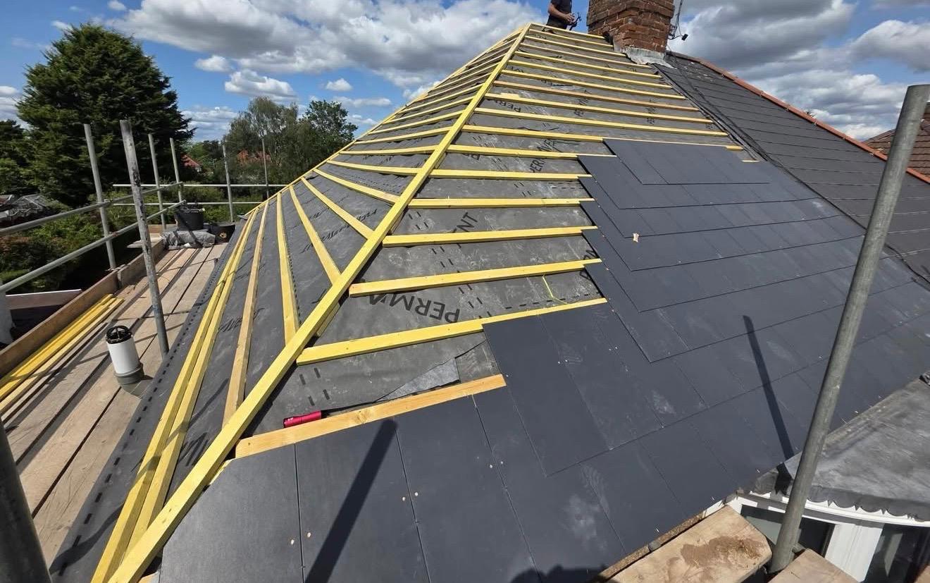 Slate roof being installed by Goldway Roofing
